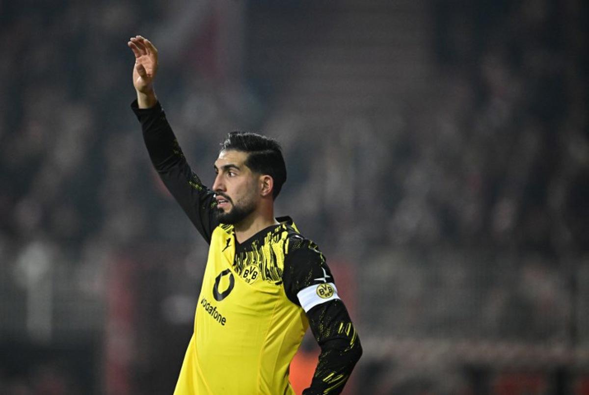 Dortmund's German midfielder #23 Emre Can gestures during the German first division Bundesliga football match between Union Berlin and BVB Borussia Dortmung in Berlin, Germany, on January 24, 2026. Tobias SCHWARZ / AFP