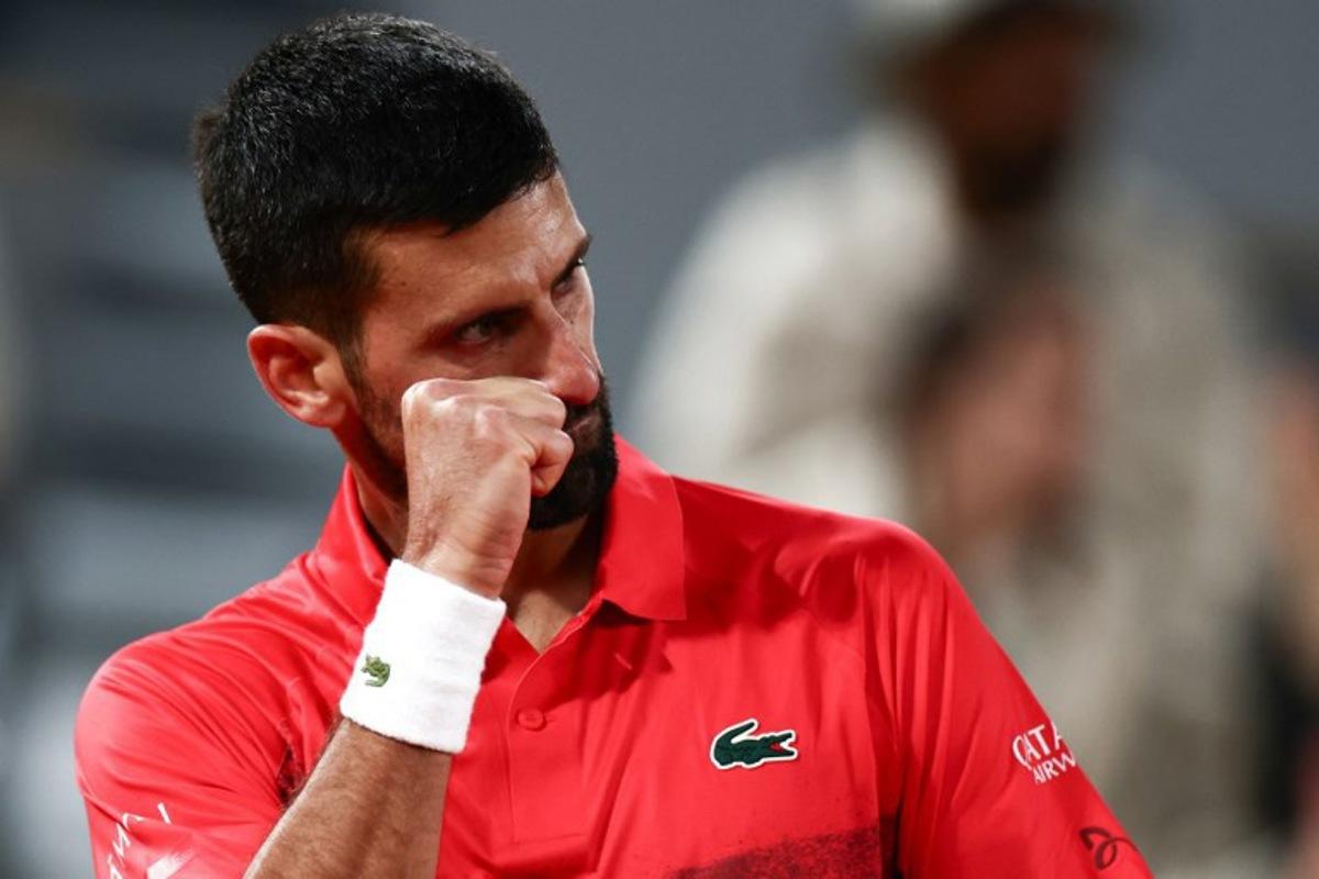 Serbia's Novak Djokovic reacts after a point during his men's singles quarter-final match against Germany's Alexander Zverev on day 11 of the French Open tennis tournament on Court Philippe-Chatrier at the Roland-Garros Complex in Paris on June 4, 2025. Thibaud MORITZ / AFP