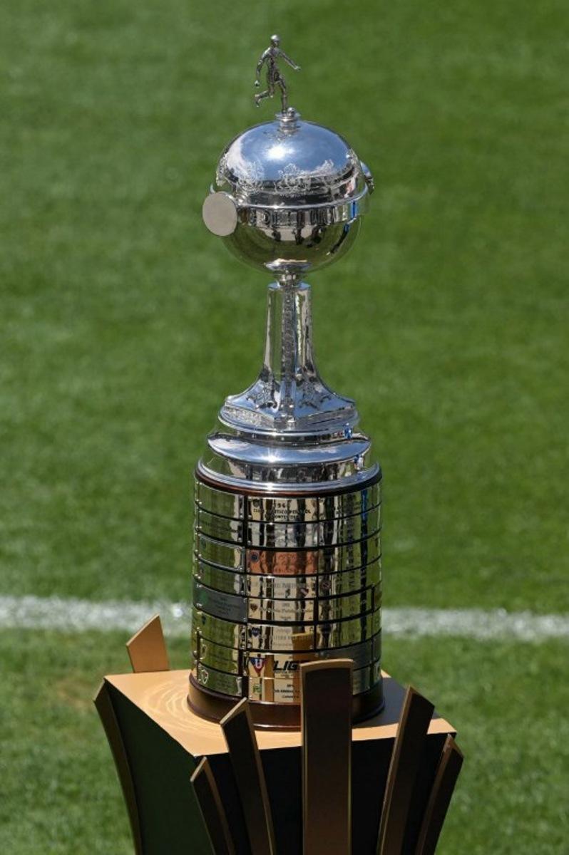 The Copa Libertadores trophy is on display at Mas Monumental stadium in Buenos Aires, on November 29, 2024, on the eve of the Copa Libertadores final football match between Brazil's Atletico Mineiro and Brazil's Botafogo. JUAN MABROMATA / AFP