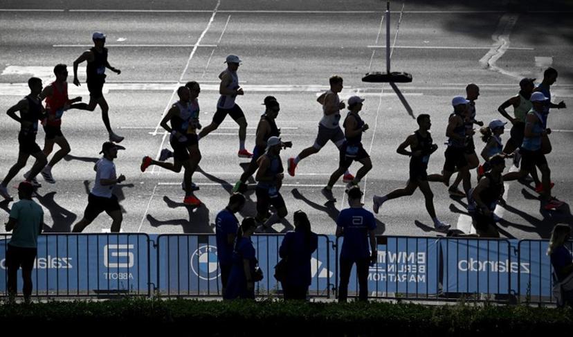 Runners take part in the 51st edition of the Berlin Marathon in Berlin, Germany on September 21, 2025. Tobias SCHWARZ / AFP