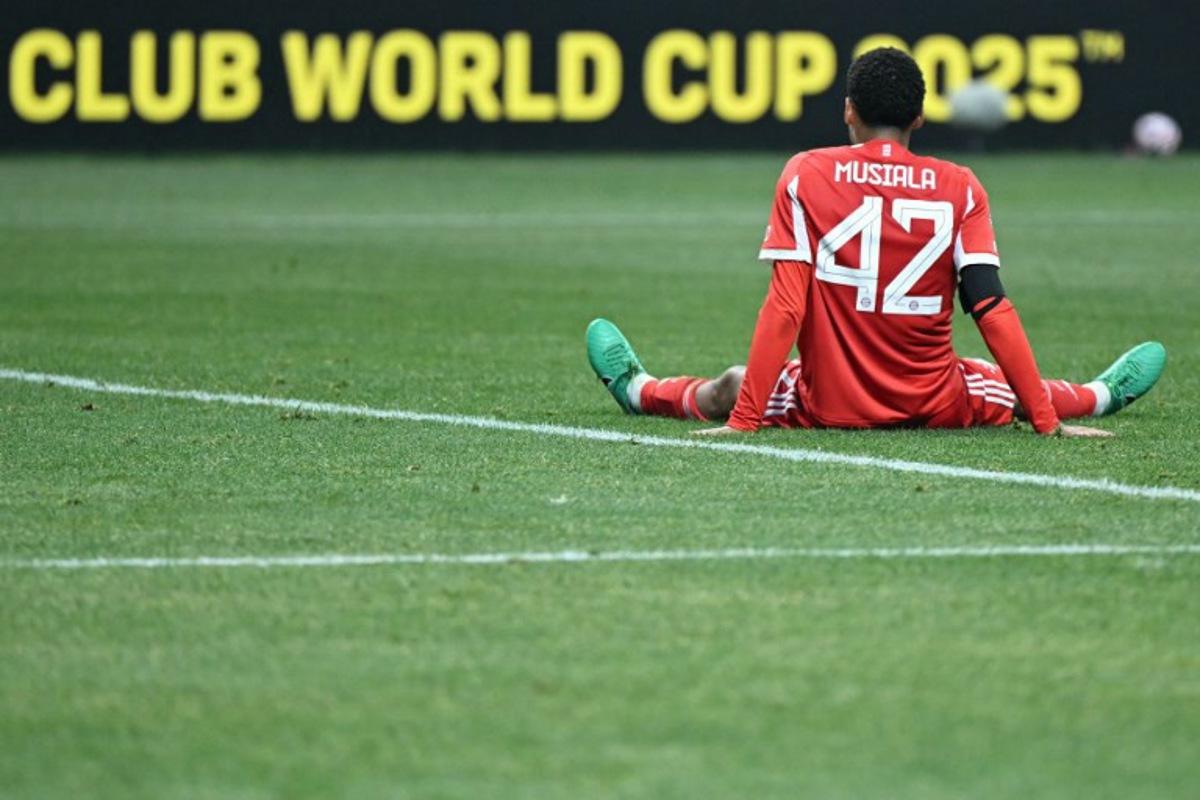 Bayern Munich's German midfielder #42 Jamal Musiala reacts during the FIFA Club World Cup 2025 quarterfinal football match between France's Paris Saint-Germain and Germany's Bayern Munich at the Mercedes-Benz Stadium in Atlanta on July 5, 2025. PATRICIA DE MELO MOREIRA / AFP