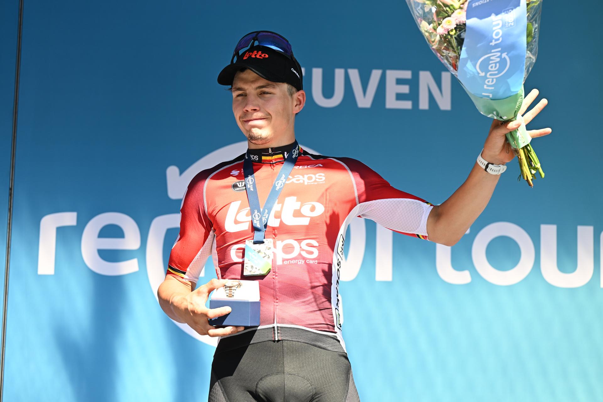 Belgian Arnaud De Lie of Lotto Cycling Team celebrates on the podium after winning the fifth and last stage of the 'Renewi Tour' multi-stage cycling race, 185km from and to Leuven on Sunday 24 August 2025. The five-day race takes place in Belgium and the Netherlands. BELGA PHOTO DAVID PINTENS