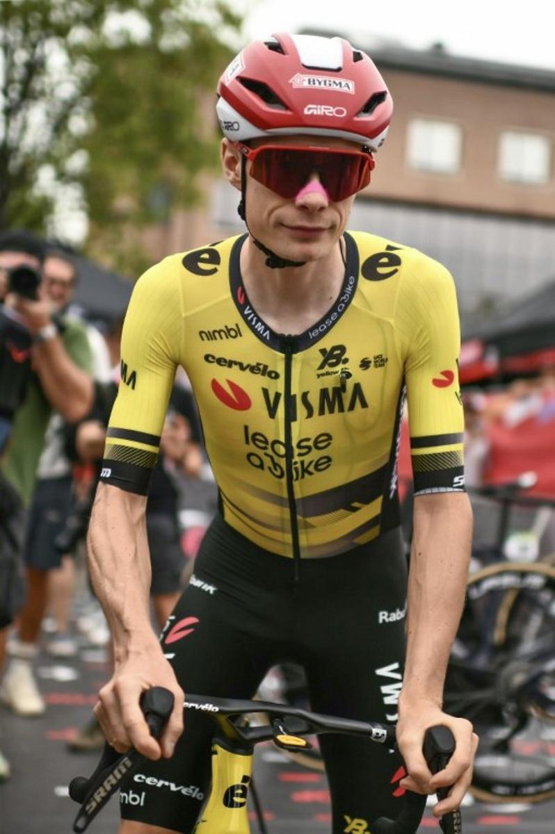 Team Visma-Lease a bike's Danish rider Jonas Vingegaard arrives to compete in the second stage of the Vuelta a Espana, a 159,6 km race between Alba and Limone Piemonte, in Italy's Piemonte region, on August 24, 2025. Marco BERTORELLO / AFP