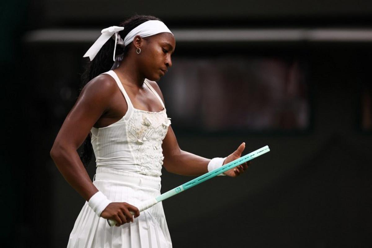 US player Coco Gauff reacts as she plays against Ukraine's Dayana Yastremska during their women's singles first round tennis match on the second day of the 2025 Wimbledon Championships at The All England Lawn Tennis and Croquet Club in Wimbledon, southwest London, on July 1, 2025. HENRY NICHOLLS / AFP