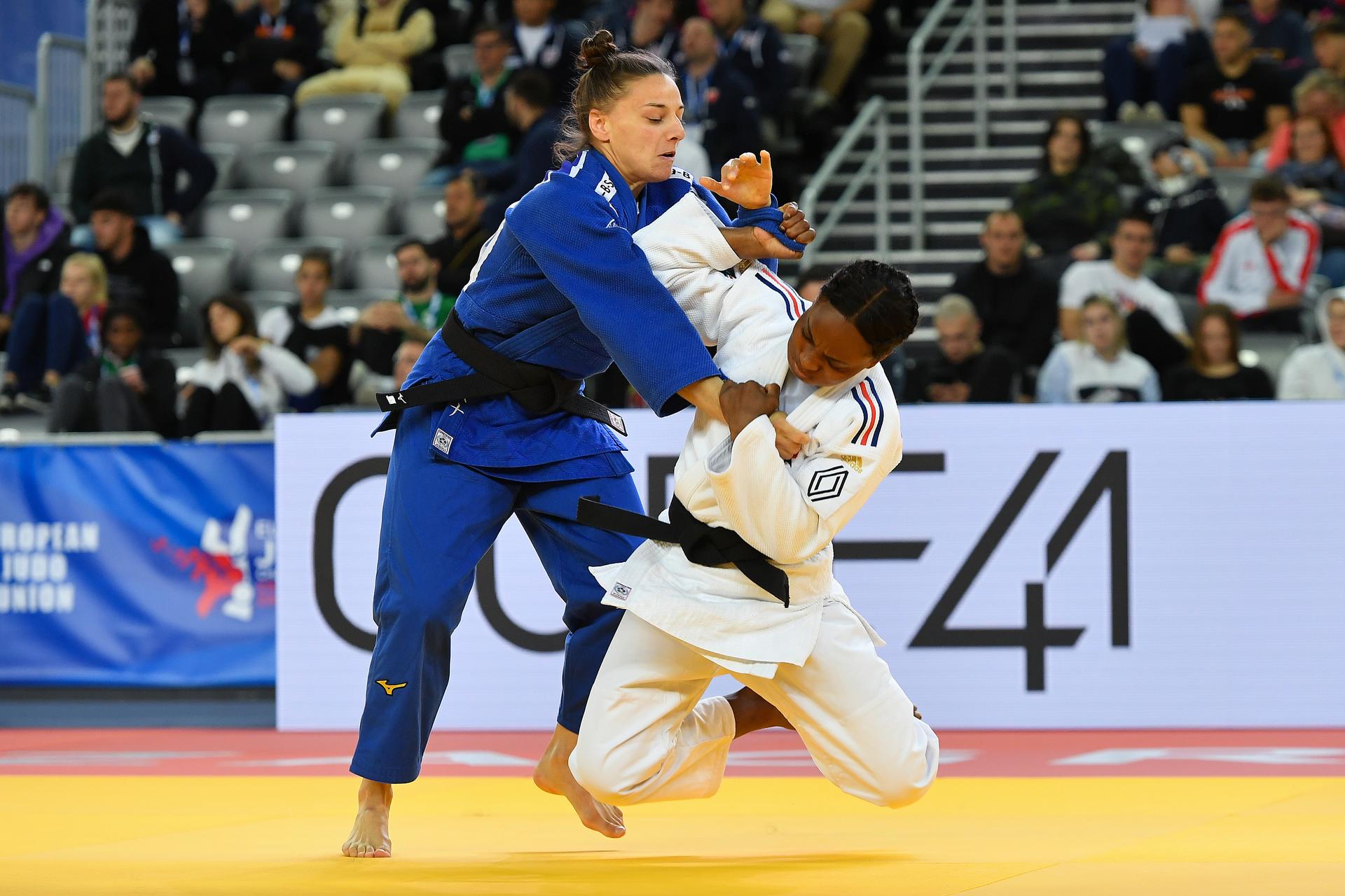 Belgian Mina Libeer (blue) and French Priscilla Gneto (white) pictured in action during a fight in the women's -57kg competition at the European Championships judo in Zagreb, Croatia on Thursday 25 April 2024. The tournament is taking place from 25 tot 27 April. BELGA PHOTO NIKOLA KRSTIC