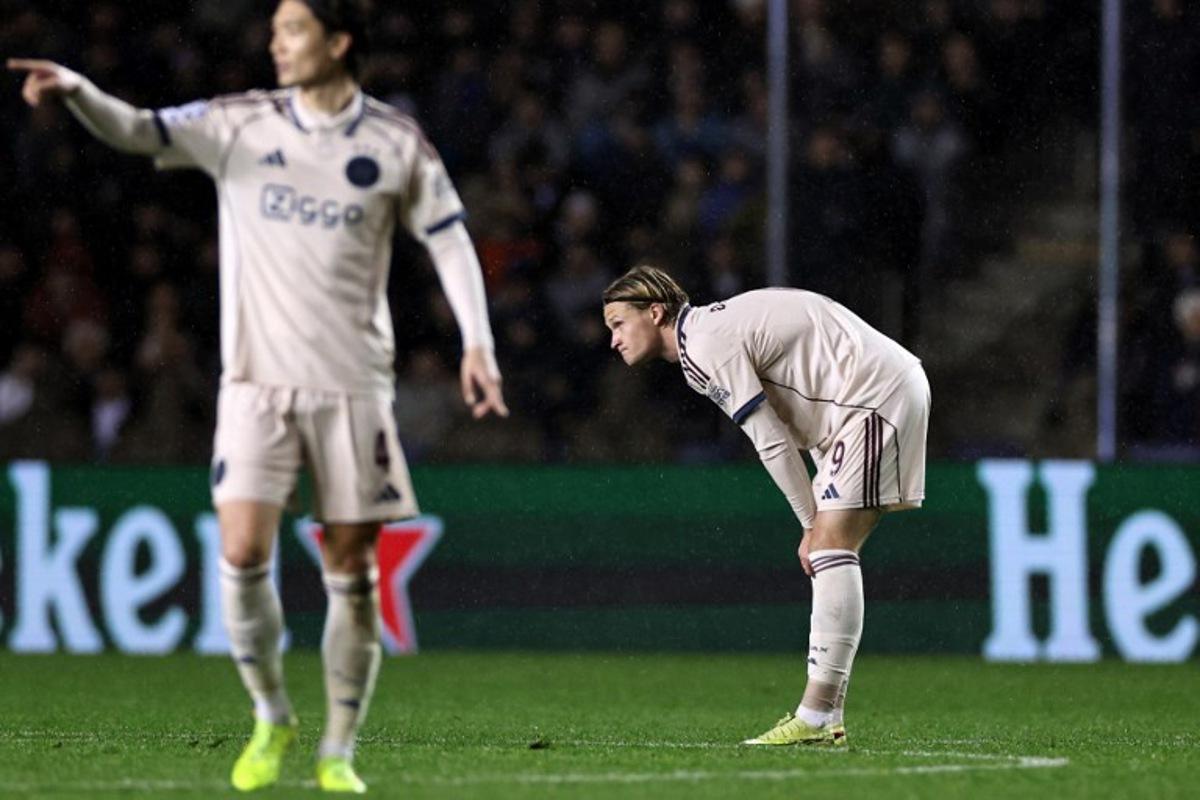 Ajax's Danish forward #09 Kasper Dolberg celebrates after scoring the team's first goal during the UEFA Champions League league phase football match between Qarabag and Ajax at the Tofiq Bahramov Republican Stadium in Baku on December 10, 2025. Giorgi ARJEVANIDZE / AFP