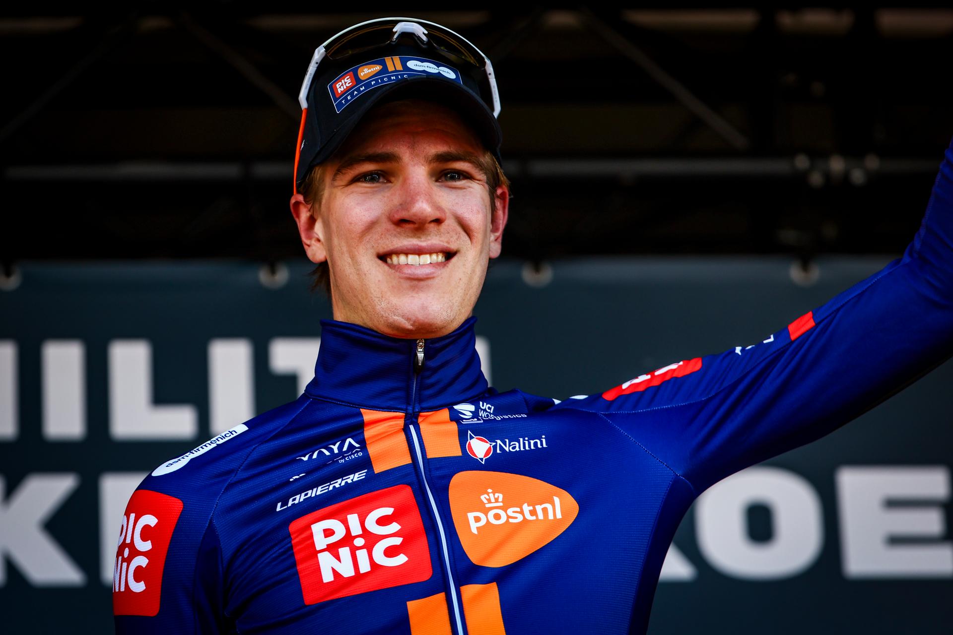 Dutch Nils Eekhoff of Team Picnic PostNL celebrates on the podium after winning the 'Nokere Koerse' one day cycling race for men elite, 188.1 km from Deinze to Nokere, on Wednesday 19 March 2025. BELGA PHOTO DAVID PINTENS