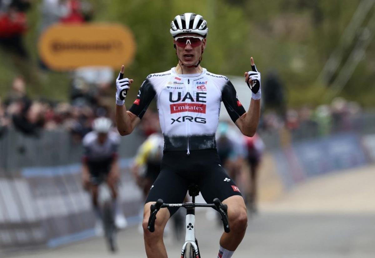 UAE Team Emirates XRG's Spanish rider Juan Ayuso celebrates after victory as he crosses the finish of the 7th stage of the 108th Giro d'Italia cycling race 168kms from Castel di Sangro to Tagliacozzo on May 16, 2025. Luca Bettini / AFP