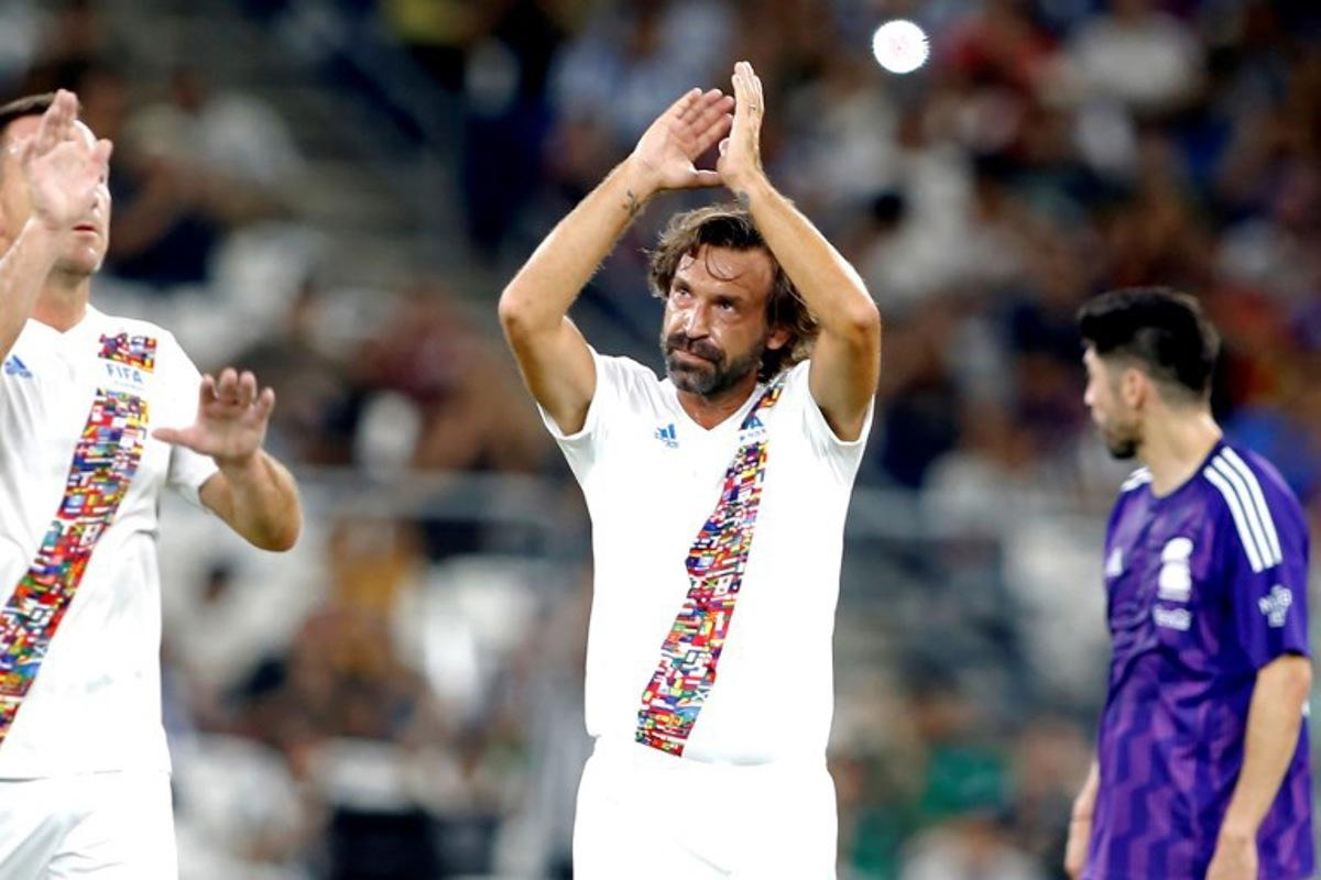 Fifa Legend's Italian midfielder Andrea Pirlo (C) celebrates after scoring during the 'Game of Legends' exhibition friendly football game between the 'Legends of Mexico' and 'FIFA International Legends', at BBVA Stadium in Monterrey, Nuevo Leon state, Mexico, on September 20, 2024. Julio Cesar AGUILAR / AFP