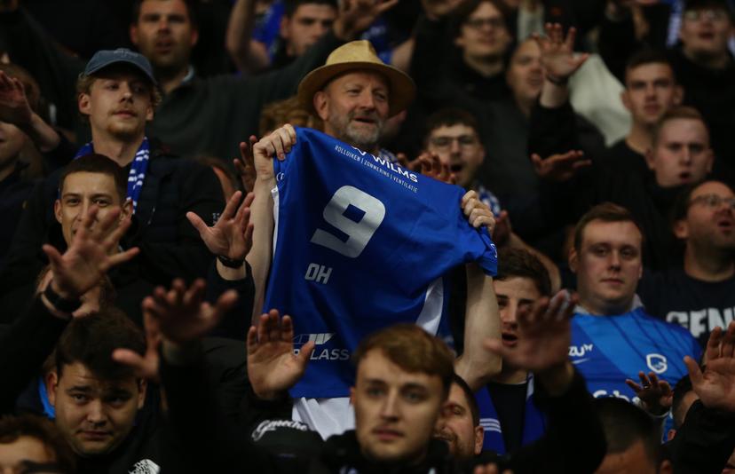 Genk fans in the stands hold up a shirt with Oh Hyeon-Gyu's name on it after the UEFA Europa League, league stage match at Ibrox Stadium, Glasgow. Picture date: Thursday September 25, 2025. BELGIUM ONLY