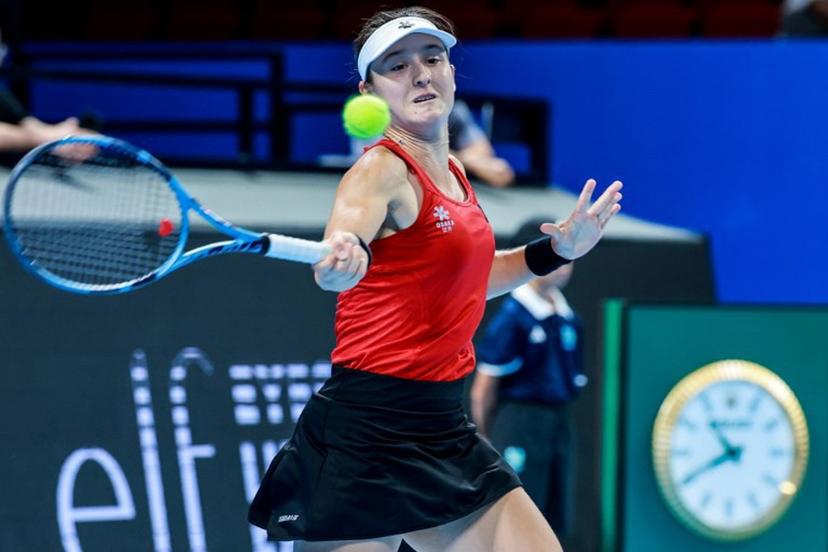 Belgium's Jana Otzipka hits a return to Ukraina's Anhelina Kalinina during their women's singles quarter-final match at the Billie Jean King Cup tennis tournament in Shenzhen, southern China's Guangdong province on September 24, 2026. CN-STR / AFP