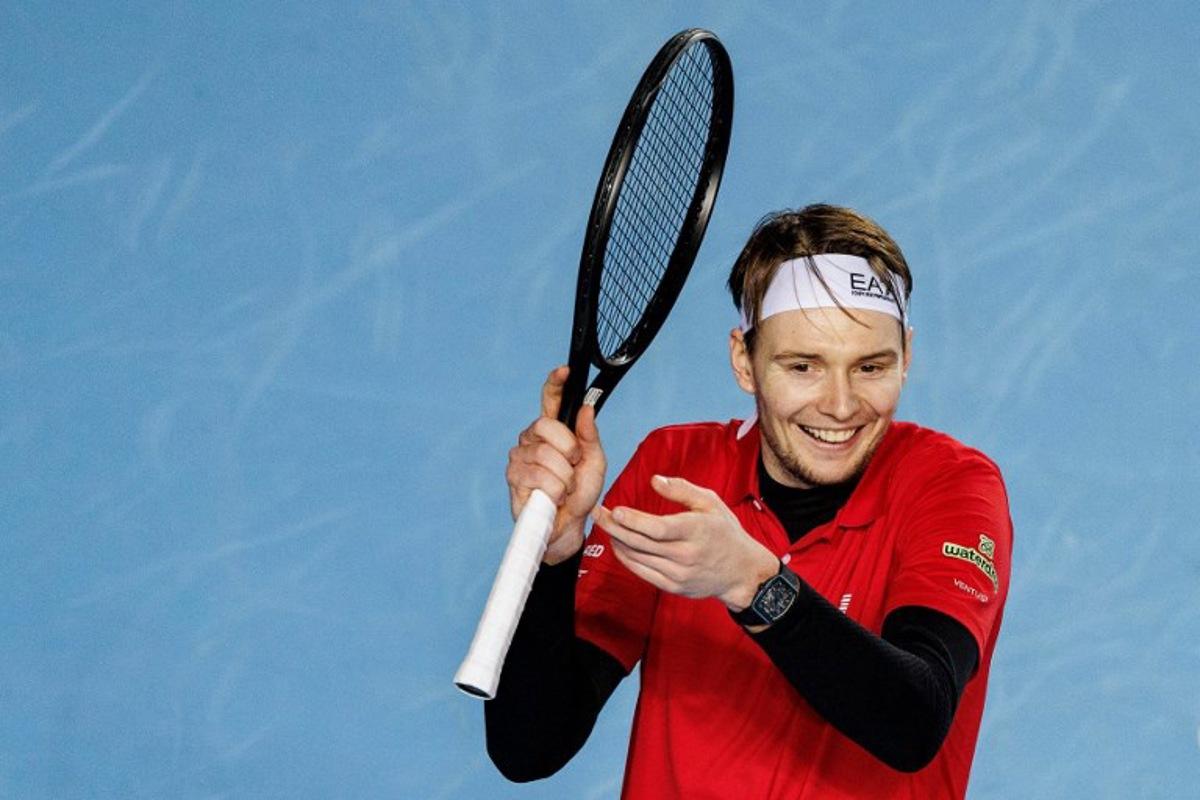 Kazakhstan's Alexander Bublik reacts after winning a point against USA's Marcos Giron during their men's singles semi-final match at the Hong Kong Tennis Open in Hong Kong on January 10, 2026. May JAMES / AFP