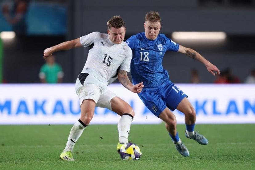 James McGarry of New Zealand (L) competes for the ball with Topi Keskinen of Finland (R) during the international friendly football match between New Zealand and Finland at Eden Park in Auckland on March 27, 2025. Michael Bradley / AFP
