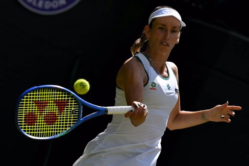 Belgium's Elise Mertens returns to Kazakhstan's Elena Rybakina during their women's singles third round tennis match on the sixth day of the 2026 Wimbledon Championships at The All England Lawn Tennis and Croquet Club in Wimbledon, southwest London, on July 4, 2026. Glyn KIRK / AFP