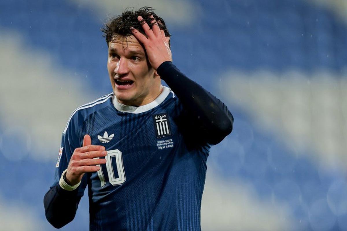 Greece's forward #10 Christos Tzolis reacts after scoring his team's first goal during the UEFA Nations League phase group A2 football match between Serbia and Greece at the Rajko Mitic Stadium in Belgrade on September 24, 2026. Pedja Milosavljevic / AFP