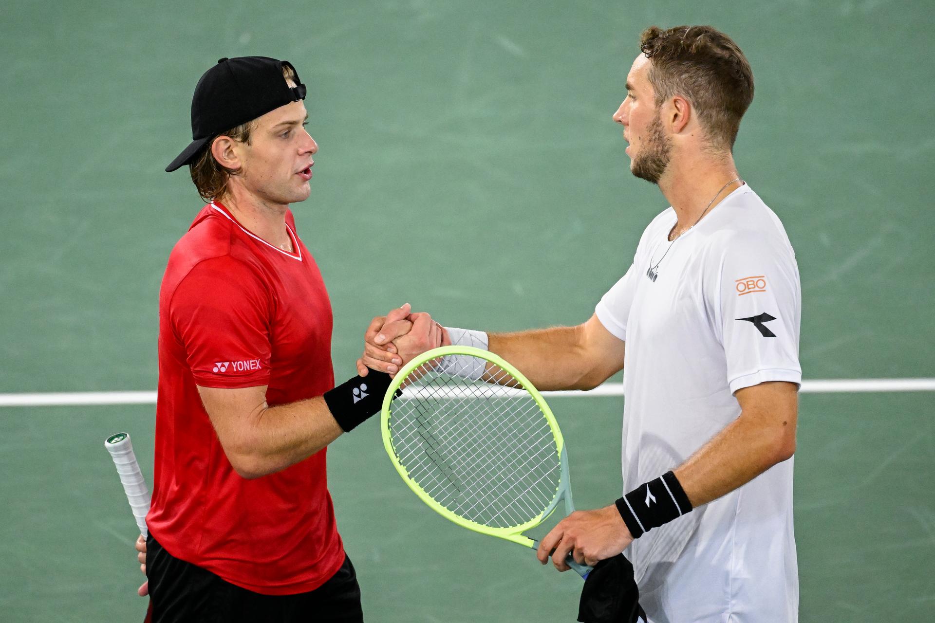 Belgian Zizou Bergs and German Jan-Lennard Struff pictured after a match between German Struff and Belgian Bergs, the first game between the Belgian team and Germany, in Group C of the group stage of the 2022 Davis Cup finals, Friday 16 September 2022, in Hamburg, Germany. Belgium will compete from 13 to 18 September against Australia, Germany and France in Group C. BELGA PHOTO LAURIE DIEFFEMBACQ