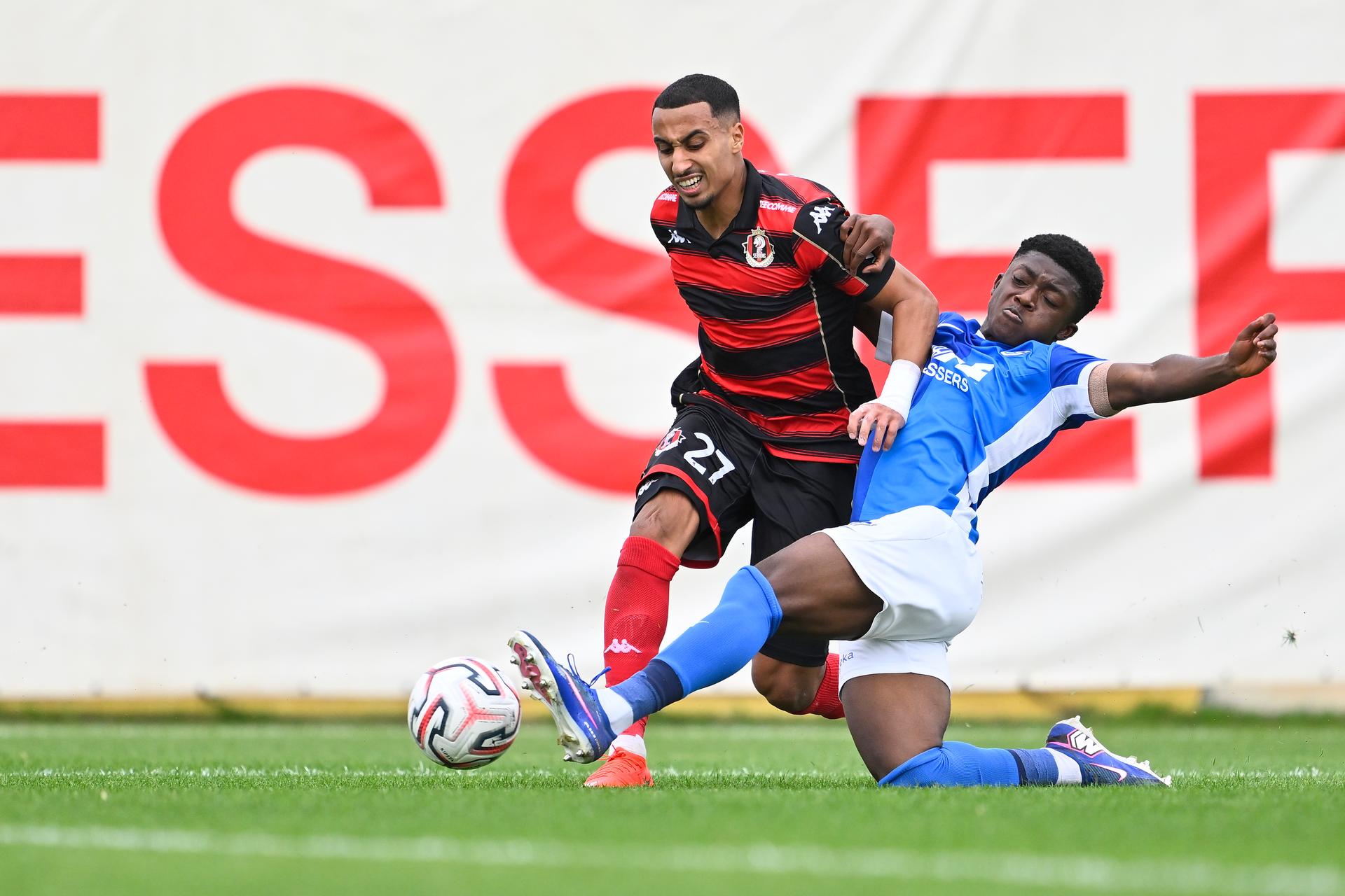 Seraing's Amine Messoussa and Jong Genk's Emmanuel Sarfo fight for the ball during a soccer match between Jong Genk (U21) and RFC Seraing, Saturday 19 September 2026 in Genk, on day 6 of the 2026-2027 'Challenger Pro League' 1B second division of the Belgian championship. BELGA PHOTO JOHAN EYCKENS
