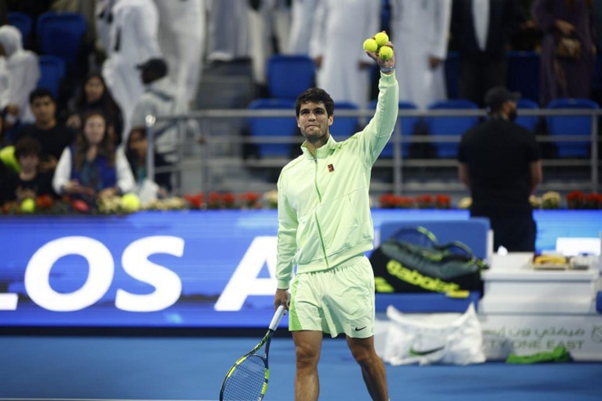 Spain's Carlos Alcaraz reacts after winning their men's singles semi-final match against Russia's Andrey Rublev at the Qatar Open tennis tournament in Doha on February 20, 2026. Karim JAAFAR / AFP
