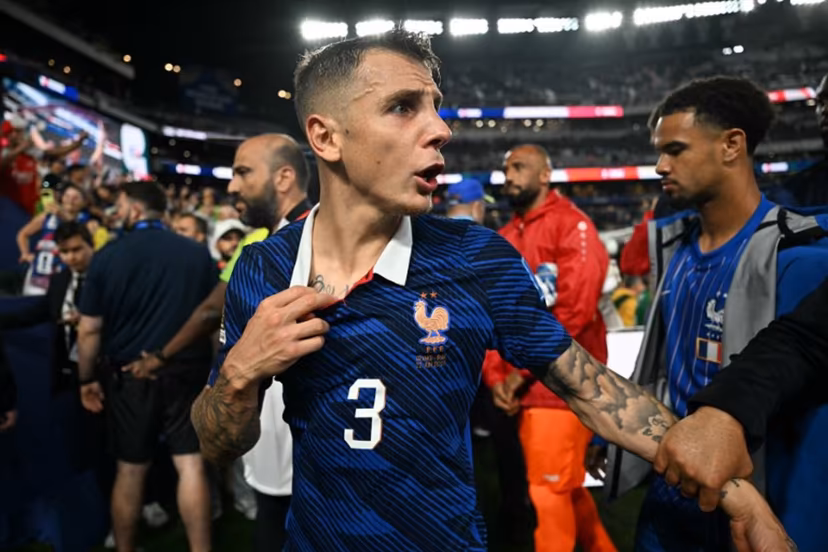 France's defender #03 Lucas Digne gestures as he leaves the pitch after winning the 2026 World Cup Group I football match between France and Iraq at the Philadelphia Stadium in Philadelphia on June 22, 2026. MAURO PIMENTEL / AFP