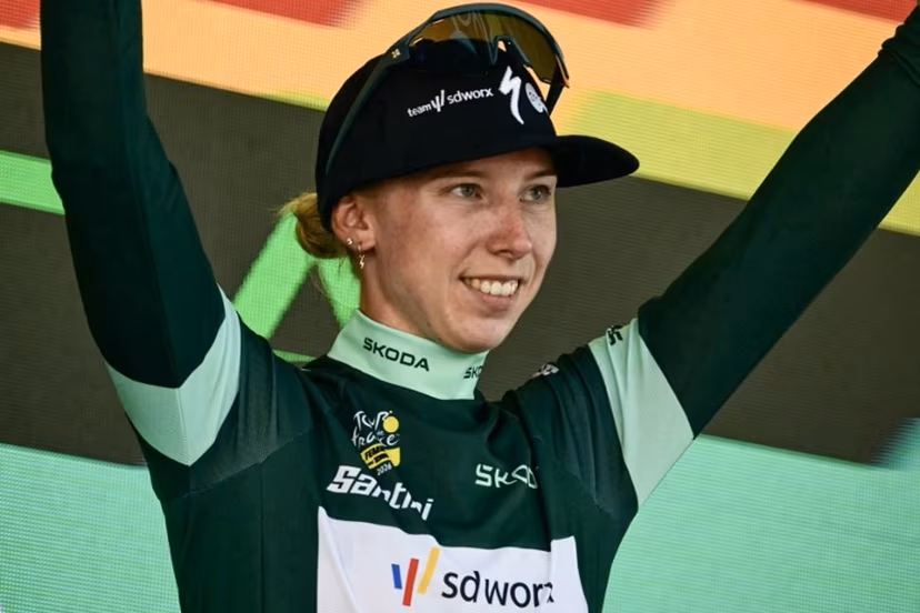 Team SD Worx-Protime's Dutch rider Lorena Wiebes celebrates on the podium with the best sprinter's green jersey after the 6th (out of 9) stage of the fifth edition of the Women's Tour de France cycling race, 153.4 km from Montbrison to Tournon-sur-Rhone, in Tournon-sur-Rhone, central-eastern France on August 6, 2026. NICOLAS TUCAT / AFP