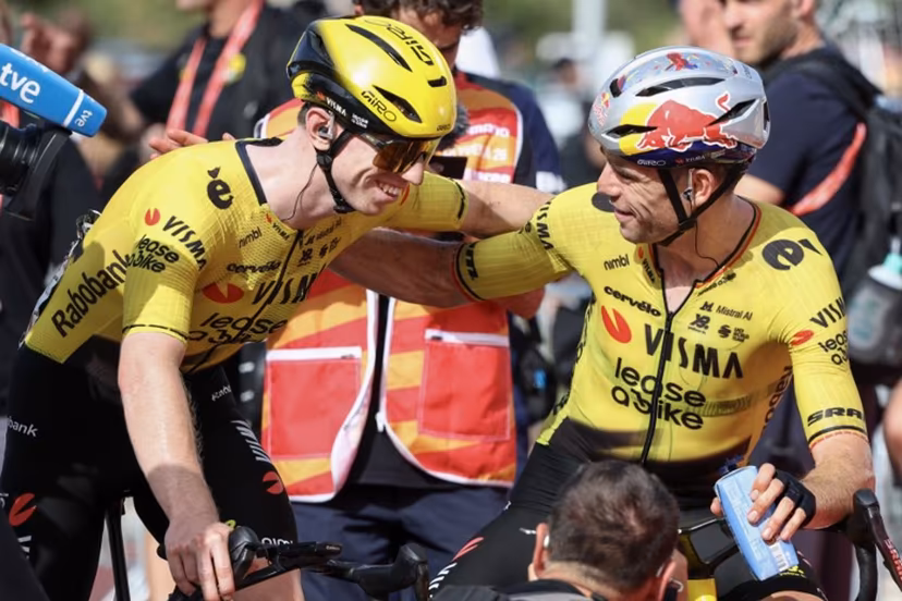 Team Visma-Lease a bike's British rider Matthew Brennan (L) is congratulated by teammate Team Visma-Lease a bike's French rider Christophe Laporte after winning the fifth stage of the Vuelta a Espana 2026, a 173,4 km race between Falset and Roquetes on August 26, 2026. Josep LAGO / AFP