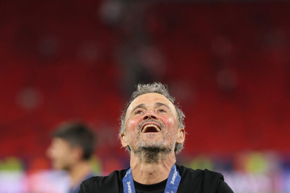 Paris Saint-Germain's Spanish head coach Luis Enrique celebrates winning the UEFA Champions League final football match between Paris Saint-Germain (PSG) and Arsenal FC at the Puskas Arena in Budapest on May 30, 2026. Odd ANDERSEN / AFP