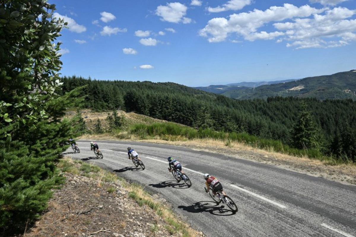 Riders compete during the 6th (out of 9) stage of the fifth edition of the Women's Tour de France cycling race, 153.4 km from Montbrison to Tournon-sur-Rhone, in central-eastern France on August 6, 2026. NICOLAS TUCAT / AFP