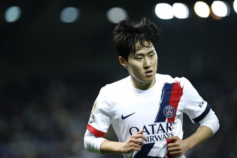 Paris Saint-Germain's South Korean midfielder #19 Lee Kang-in runs off the ball during the French L1 football match between Paris FC and Paris Saint-Germain (PSG) at the Stade Jean-Bouin in Paris on May 17, 2026. Kenzo TRIBOUILLARD / AFP