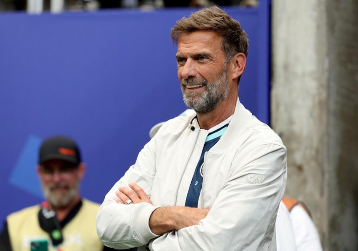(FILES) German coach Jurgen Klopp attends the FIFA World Cup 2026 Group E match between Germany and Curacao at Houston Stadium on June 14, 2026 in Houston, Texas. Jurgen Klopp insisted on July 4, 2026 he was recharged and "ready" for what he said would be "intensive discussions" over becoming the new coach of Germany. Klopp told the German FA (DFB) on July 3 that he was "fundamentally willing" to take over as Germany's coach after Julian Nagelsmann resigned. ALEXANDER HASSENSTEIN / GETTY IMAGES NORTH AMERICA / AFP