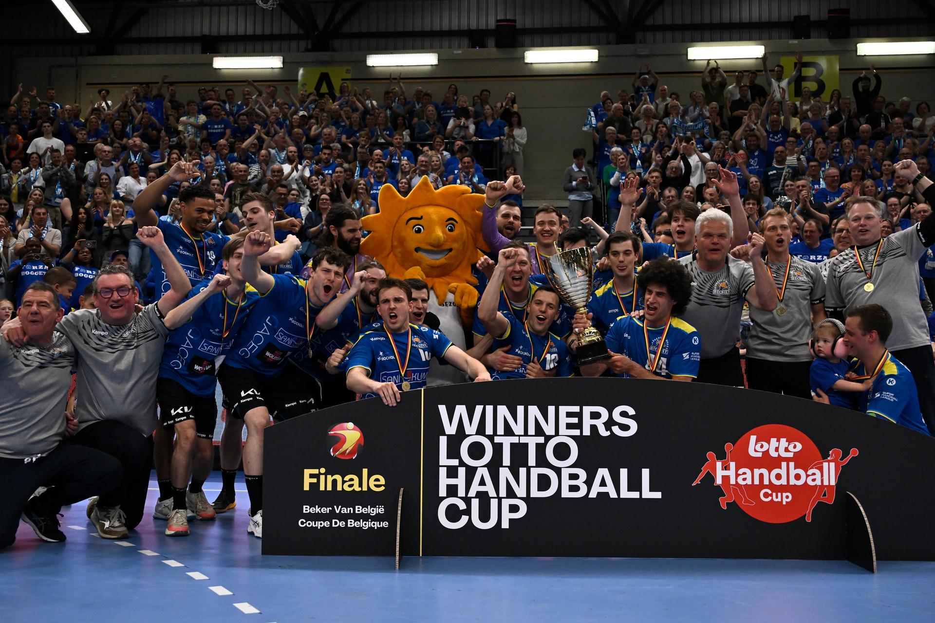 Bocholt's players celebrate after winning a handball game between Hubo handbal Hasselt and Achilles Bocholt, Saturday 19 April 2025, in Hasselt, the men's final of the Belgian handball cup. BELGA PHOTO JOHAN EYCKENS