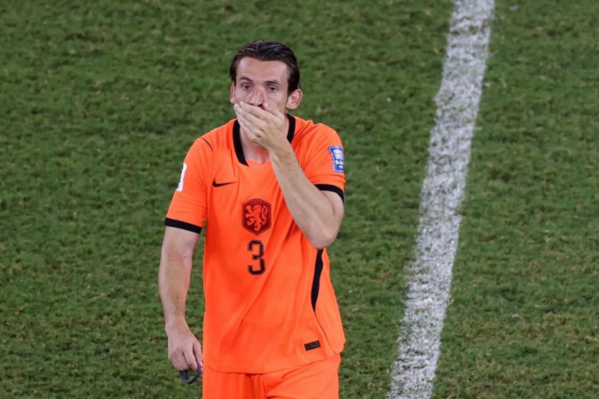 Netherlands' midfielder #03 Marten de Roon reacts after losing at the end of the 2026 World Cup round of 32 football match between the Netherlands and Morocco at the Monterrey Stadium in Guadalupe on June 29, 2026. Julio Cesar AGUILAR / AFP