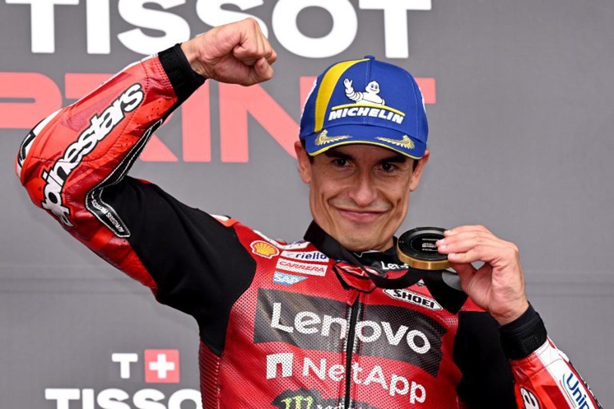Ducati Lenovo Team's Spanish rider Marc Marquez celebrates after winning the MotoGP sprint race at the Australian MotoGP Grand Prix on Phillip Island on October 24, 2026. William WEST / AFP
