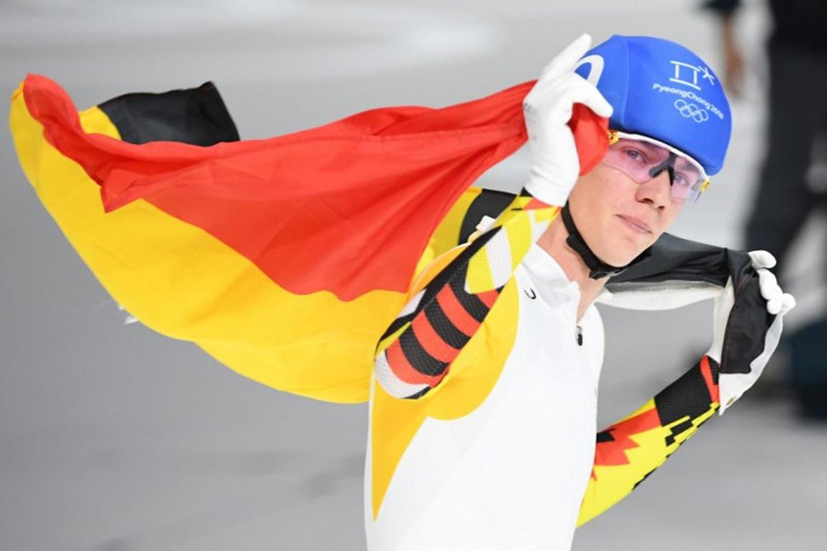 Belgium's Bart Swings celebrates his silver medal win in the men's mass start final speed skating event during the Pyeongchang 2018 Winter Olympic Games at the Gangneung Oval in Gangneung on February 24, 2018. Roberto SCHMIDT / AFP