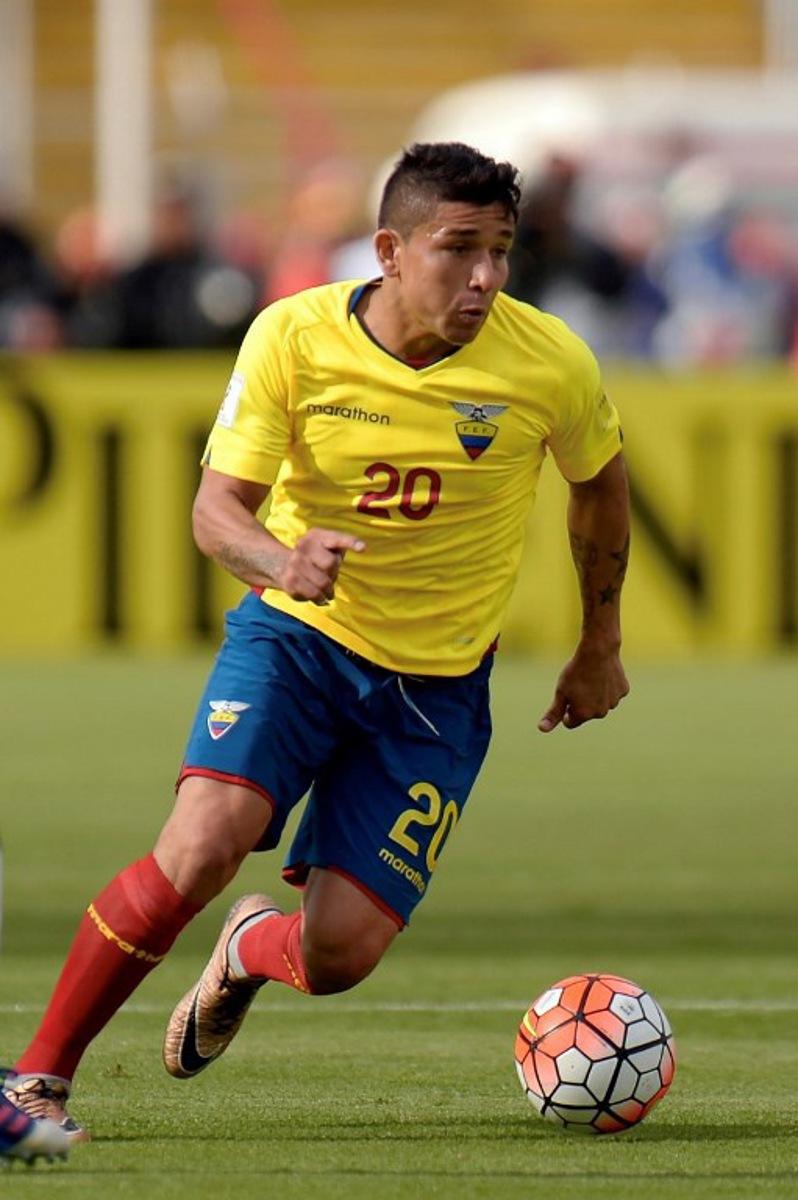(FILES) Ecuador's defender Mario Pineida drives the ball during the 2018 FIFA World Cup qualifier football match against Colombia in Quito, on March 28, 2017. Ecuadorian footballer Mario Pineida was killed in an attack in the port city of Guayaquil on December 17, 2025, a hotspot for violence in the country due to drug trafficking, according to his club Ecuador's Barcelona. Juan CEVALLOS / AFP