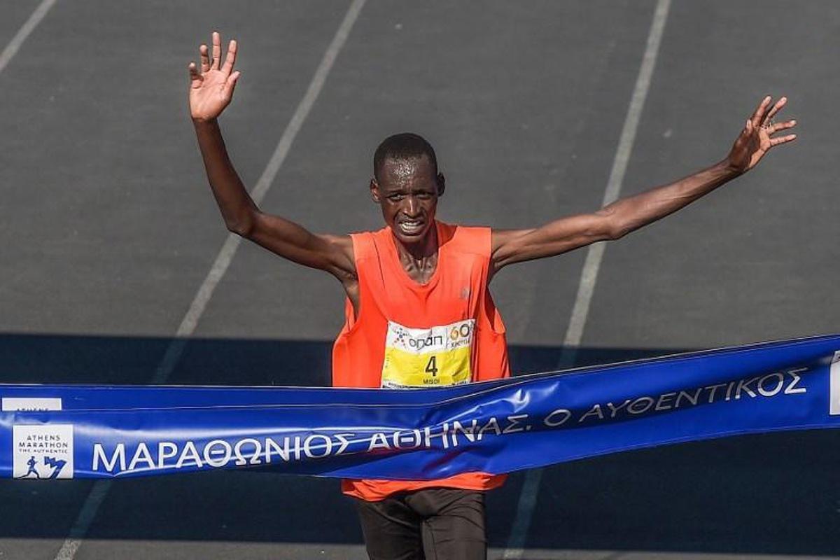 Brimin Kipkorir Misoi from Kenya runs to win the 36th Athens Classic Marathon 'The authentic' at the Panathenaic stadium in Athens on November 11, 2018. ANGELOS TZORTZINIS / AFP