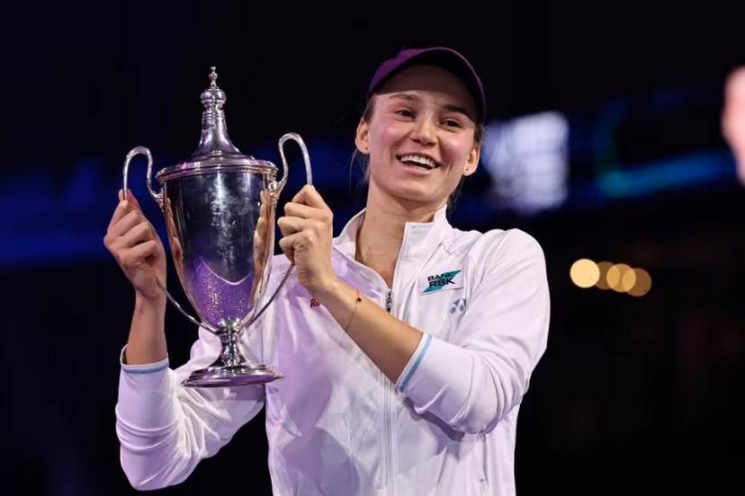 Kazakhstan's Elena Rybakina lifts the trophy after defeating Belarus' Aryna Sabalenka in the final of the Women's WTA Finals, in Riyadh on November 8, 2025. Rybakina beat world number one Aryna Sabalenka 6-3, 7-6 (7/0) to win the WTA Finals for the first time in Riyadh on November 8, to earn a record $5.235 million. Fayez NURELDINE / AFP