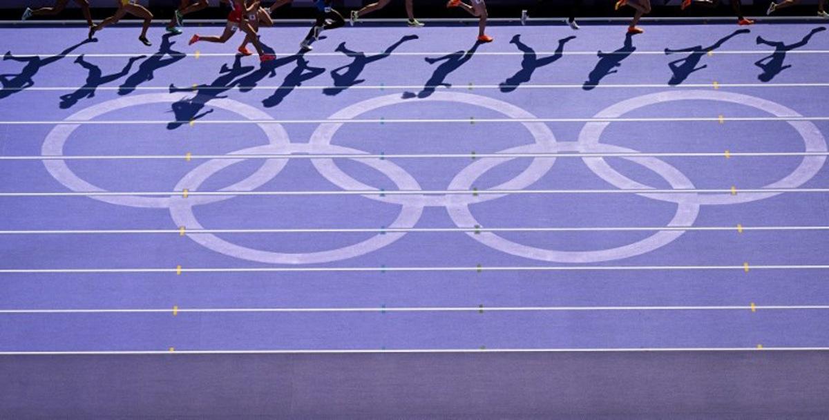 Athletes compete in the women's 1500m heat of the athletics event at the Paris 2024 Olympic Games at Stade de France in Saint-Denis, north of Paris, on August 6, 2024. Kirill KUDRYAVTSEV / AFP