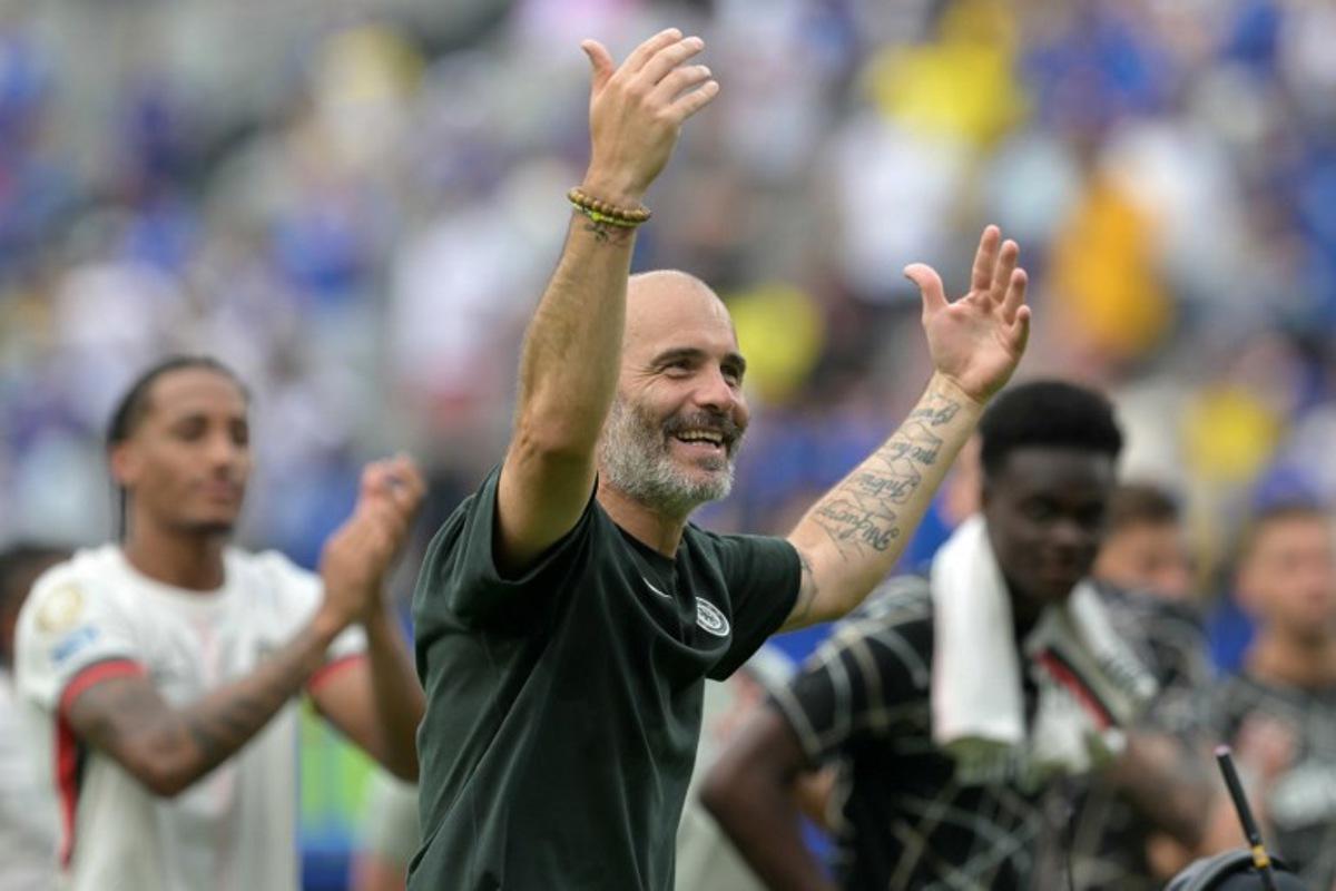 Chelsea's Italian head coach Enzo Maresca celebrates after winning the FIFA Club World Cup 2025 semifinal football match between Brazil's Fluminense and England's Chelsea at the MetLife stadium in East Rutherford, New Jersey on July 8, 2025. JUAN MABROMATA / AFP