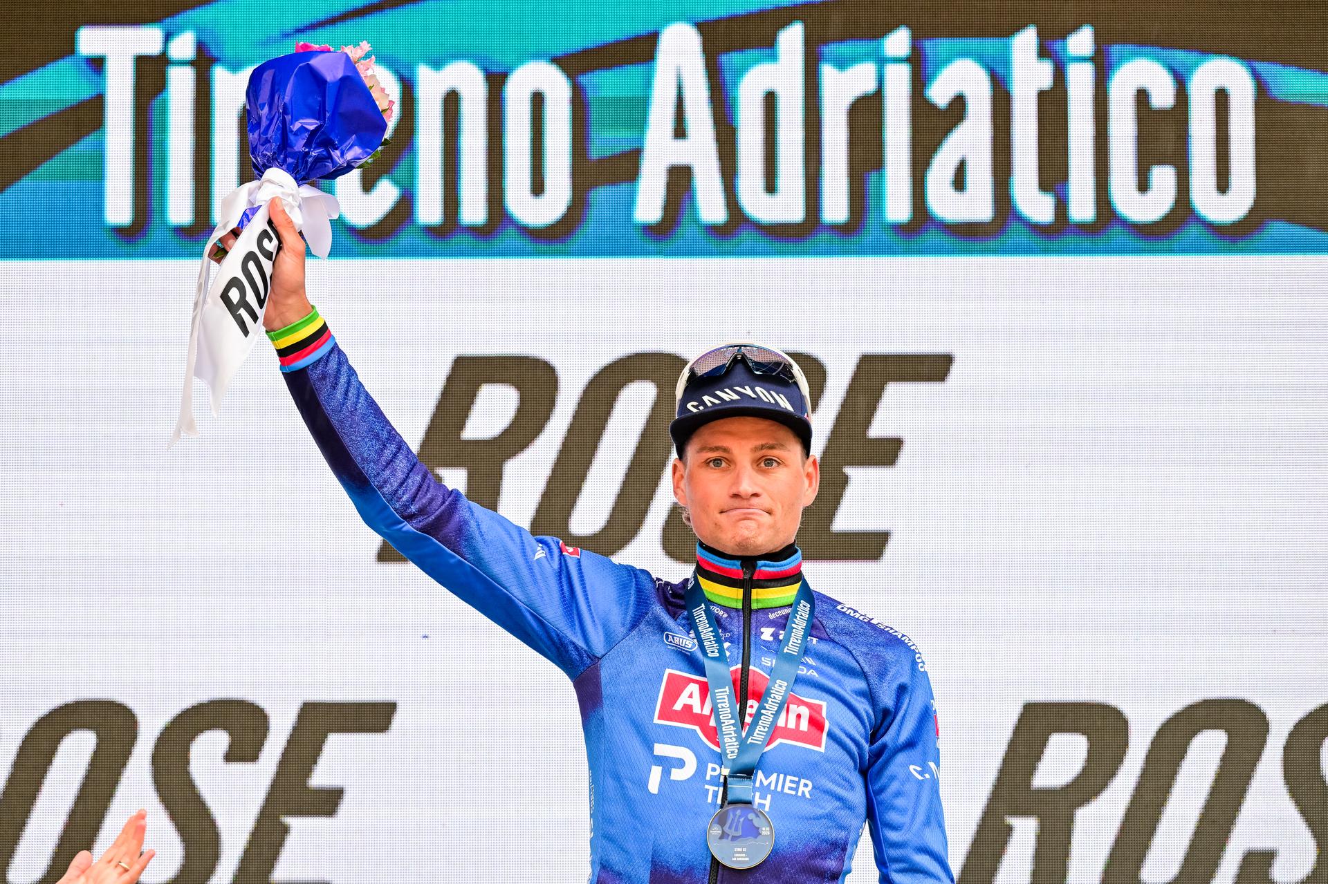 Dutch Mathieu van der Poel of Alpecin-Premier Tech celebrates on the podium after winning the second stage of the Tirreno-Adriatico cycling race, from Camaiore to San Gimignano (206 km), Italy, Tuesday 10 March 2026. BELGA PHOTO DIRK WAEM