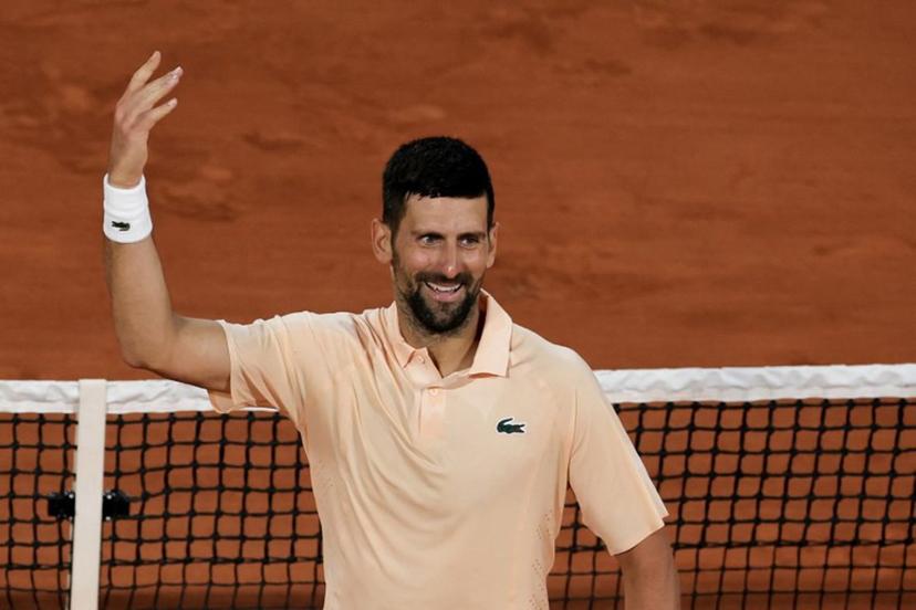 Serbia's Novak Djokovic celebrates after winning the second set as he plays against France's Giovanni Mpetshi Perricard during their men's singles match on day 1 of the French Open tennis tournament on Court Philippe-Chatrier at the Roland-Garros Complex in Paris on May 24, 2026. Thomas SAMSON / AFP