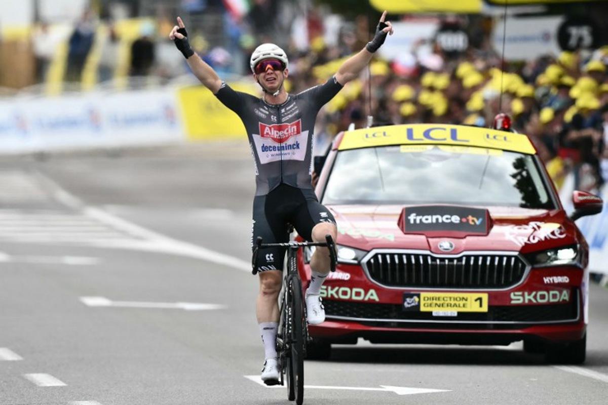Alpecin - Deceuninck team's Australian rider Kaden Groves cycles to the finish line to win the 20th stage of the 112th edition of the Tour de France cycling race, 184.2 km between Nantua and Pontarlier, in the Jura, eastern France, on July 26, 2025. Marco BERTORELLO / AFP