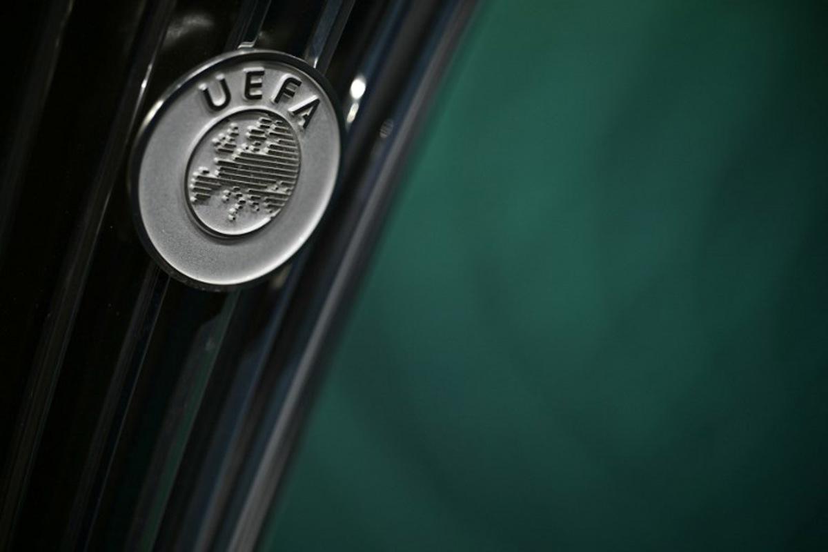 This photograph shows the UEFA logo displayed on the UEFA Conference League Cup ahead of the 2025-2026 UEFA Conference League round of 16, quarter-final and semi-final draw at the House of European Football in Nyon, western Switzerland on February 27, 2026. Harold CUNNINGHAM / AFP