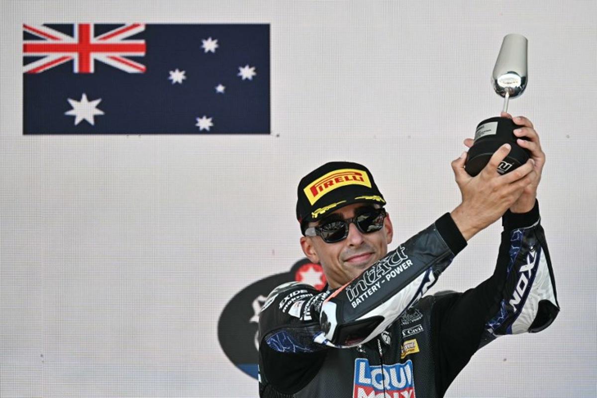 Third placed Liqui Moly Dynavolt Intact GP's Australian rider Senna Agius celebrates on the podium after the Spanish Moto2 Grand Prix at the Jerez racetrack in Jerez de la Frontera, on April 27, 2025. JAVIER SORIANO / AFP