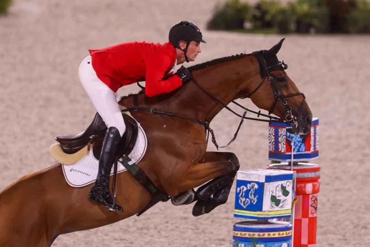 Germany's Daniel Deusser rides Killer Queen in the equestrian's jumping individual qualifying during the Tokyo 2020 Olympic Games at the Equestrian Park in Tokyo on August 3, 2021. Behrouz MEHRI / AFP