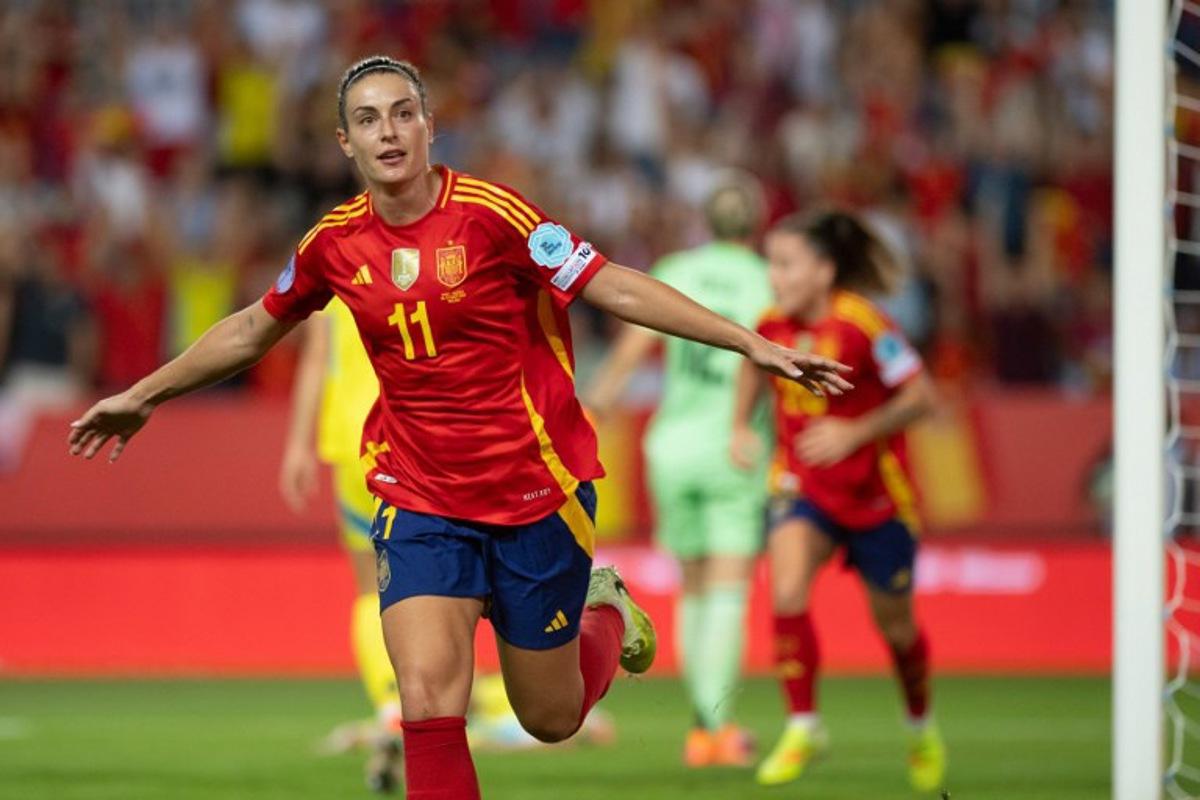 Spain's midfielder #11 Alexia Putellas celebrates scoring her team's third goal during the UEFA Women's Nations League semi-final football match between Spain and Sweden at La Rosaleda stadium in Malaga on October 24, 2025. JORGE GUERRERO / AFP