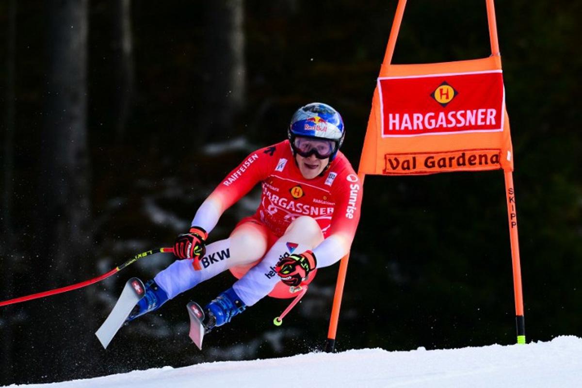 Switzerland's Marco Odermatt competes in FIS Alpine Skiing men's World Cup Downhill replacing Beaver Creek in Val Gardena, on December 18, 2025. Stefano RELLANDINI / AFP