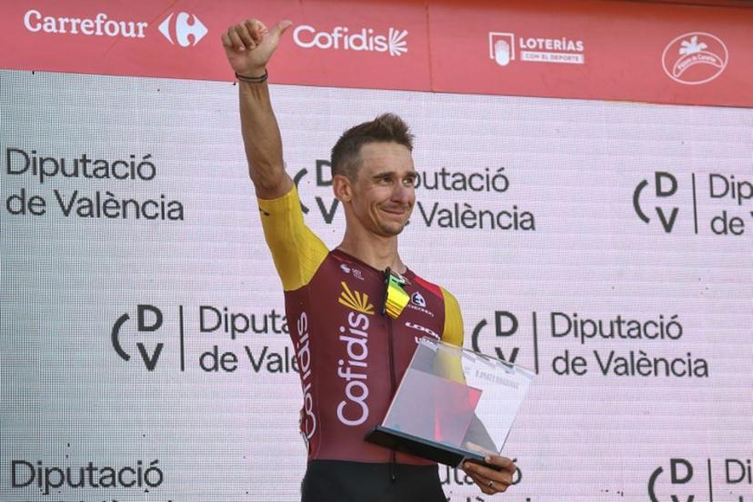 Team Cofidis' French rider Bryan Coquard celebrates on the podium after winning the eighth stage of the Vuelta a Espana 2026, a 171 km race between Pucol and Xeraco on August 29, 2026. Josep LAGO / AFP