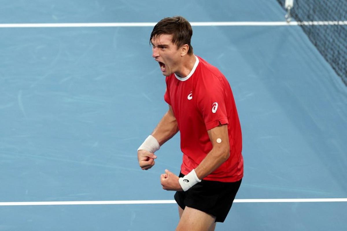 Belgium's Raphael Collignon reacts after defeating Australia's Alex de Minaur during the Davis Cup second-round qualifier tennis match at Ken Rosewall Arena in Sydney on September 13, 2025. DAVID GRAY / AFP