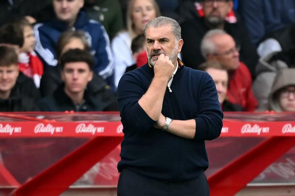 Nottingham Forest's Australian manager Ange Postecoglou reacts during the English Premier League football match between Nottingham Forest and Chelsea at The City Ground in Nottingham, central England, on October 18, 2025. JUSTIN TALLIS / AFP