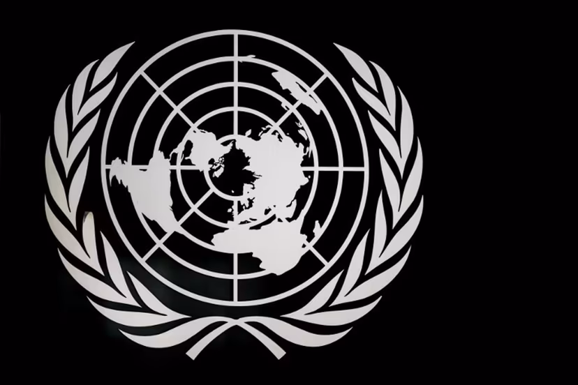 A sign of the United Nations is seen at the "Palais des Nations" building which houses the UN Offices in Geneva on March 3, 2026. Fabrice COFFRINI / AFP